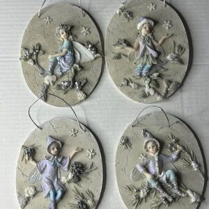 Winter themed Fairy Wall Plaques Set Of 4 Pastel Colors Pre-owned